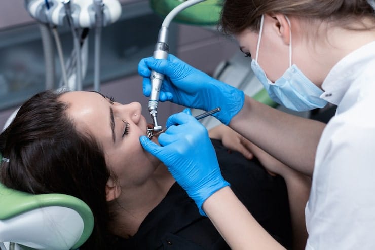 Dental filling process at dentist office